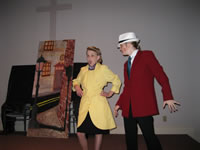 Archie and Iris Innes walking on the street after she’s been questioned by the police