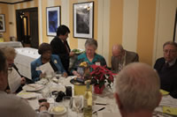 Banquet diners solving the quiz